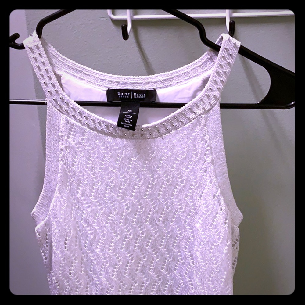 Long tank with silver beads around collar